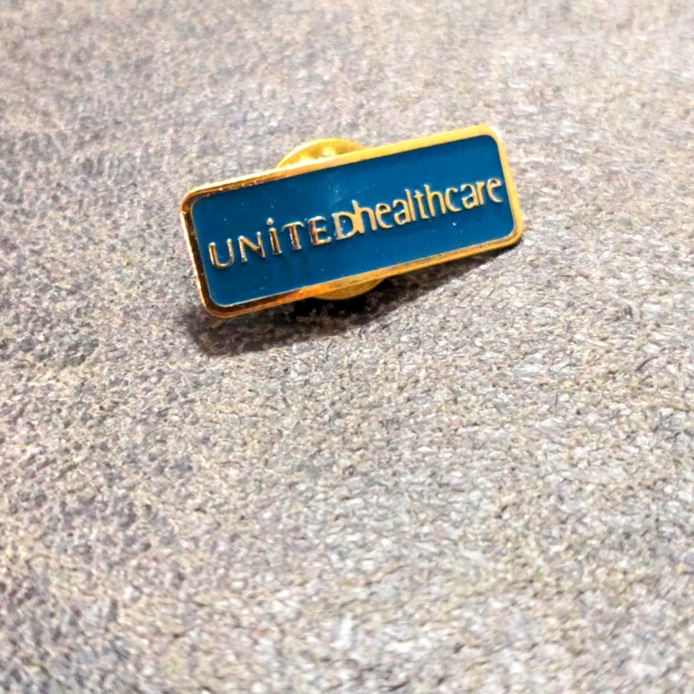 VTG United Healthcare Enamel Pin Bent